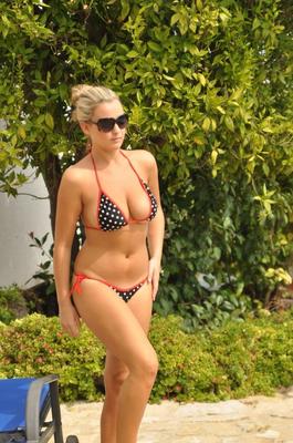 12P Blonde amateur Jodie Gasson frees her great tits from a bikini wearing shades