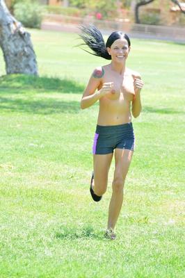 21P Petite jogger Mya strips nude & slides a glass sex toy in her twat in the park