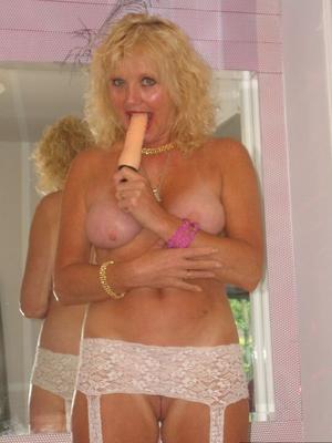 20P Older blonde Ruth masturbates with a vibrator and teases a cock in POV mode
