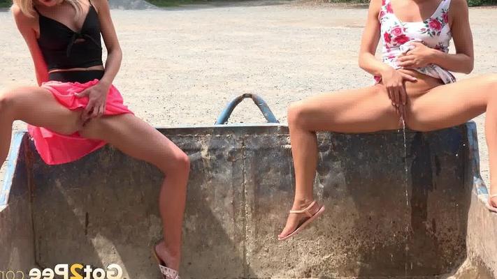 15P Blonde girls Claudia Macc & Victoria Pure pee in the bed of a refuse trailer