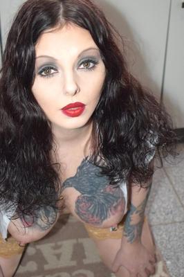 16P Tattooed brunette Lucy Ravenblood masturbates with a cucumber in her kitchen