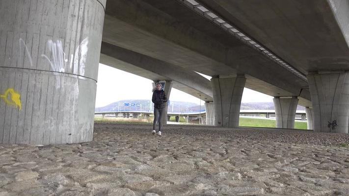 15P Short taken blonde squats for a piss underneath an overpass on a chilly day