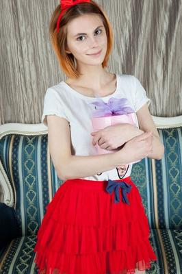 20P Young redhead Mandy wears a bow in her hair while posing nude in long socks