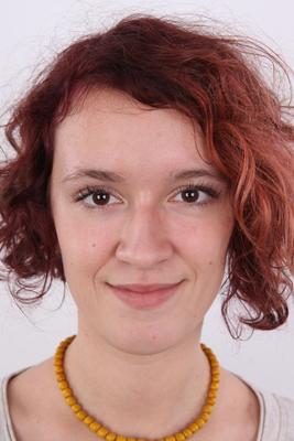 20P Redhead teen Tereza stands in her clothes and boots before getting bare naked