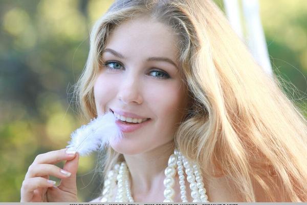 18P Long haired teen Genevieve Gandi models naked in the outdoors by herself