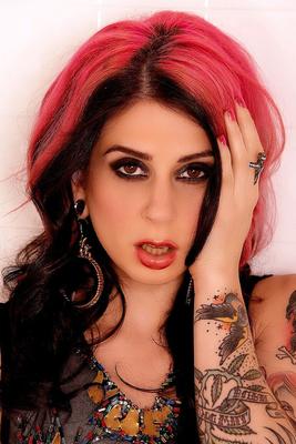 21P Inked babe Joanna Angel strips and touches her warm cunt in solo action