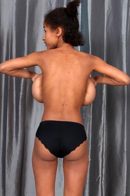 21P Ebony Addisson shows off her huge breasts and squeezes them in undies