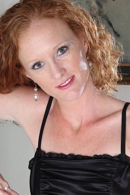 16P Beautiful redhead Ande touches her hard nipples very sensual