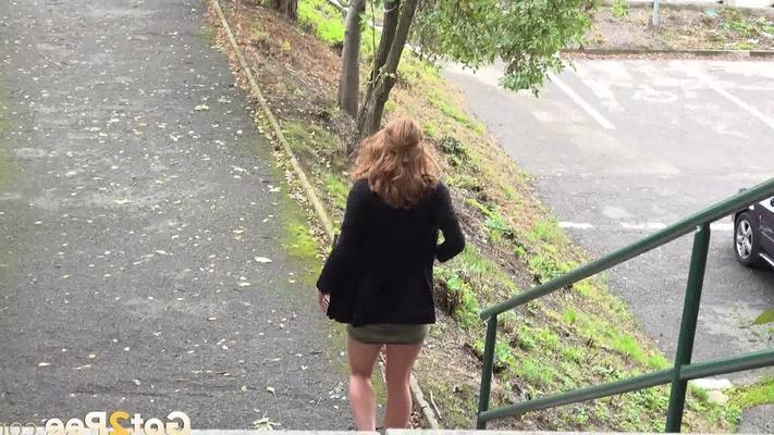 15P Natural redhead Chrissy Fox squats for a pee on a set of public steps
