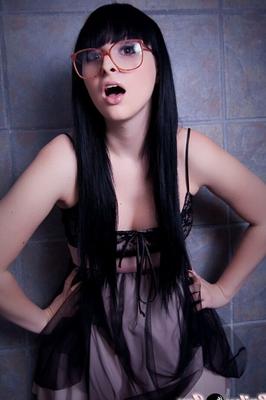 12P Glamorous Bailey Jay posing in a sexy dress