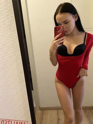 20P Black haired beauty Sasha Sparrow slowly unveils her tiny tits and tasty cunt