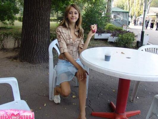 10P Young blonde amateur eating ice cream posing non nude in public