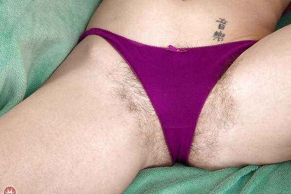 16P Hirsute broad with small tits showing off hairy legs before baring beaver