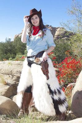 16P Pornstar Luna Star doffing cowgirl attire to pose naked with gun in desert
