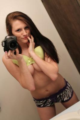 12P Amateur chick Freckles 18 sticks out her tongue while taking mirror selfies