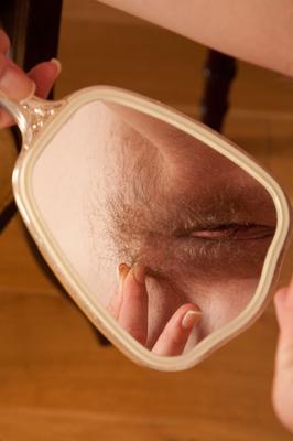 21P Slim young blonde Mary Lou inspecting her hairy pussy with a mirror