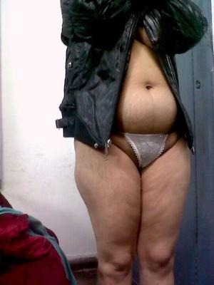 10P Fat Indian woman hides her face while adorned in a bra and thong
