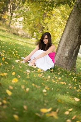 15P Brunette amateur Bryci fingers her horny pussy underneath a tree