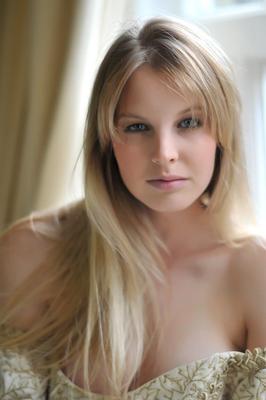 12P Blonde girl Rose takes off her petticoat to model in a girdle and nylons