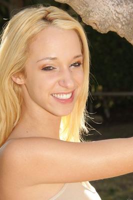16P Natural blonde Jada Stevens flaunts her hot ass as she disrobes by a tree