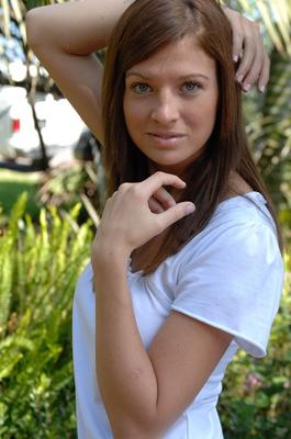 21P Blue eyed teen Gabby exposes her great juggs and poses with a toy in her cunt