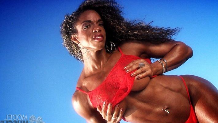 21P Bodybuilder Alexis Ellis flaunting her big muscles in red lingerie outdoors