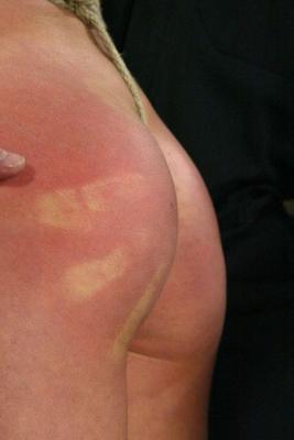 20P Blonde teen with a hot butt Kelly Wells gets spanked while tied up