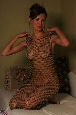 16P Teen amateur Natasha removes a revealing mesh dress to pose nude on her bed