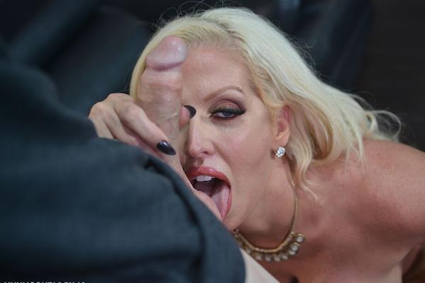 16P Top pornstar Alura Jenson holds her knockers while giving a blowjob