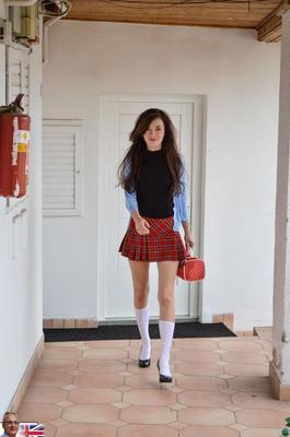 21P European schoolgirl Mischa Cross strips and shows her holes at a photoshoot