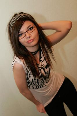 15P Young brunette Kaira 18 takes off her glasses while modelling non nude