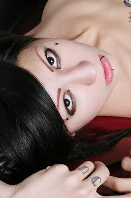 15P Goth teen Miss Seamonster strips naked in black boots and pigtails