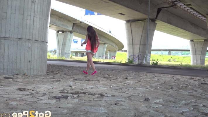 15P Lara Fox pisses in public under a bridge