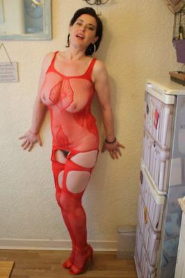 20P Big titted amateur Juicey Janey shows her dark patch in revealing lingerie