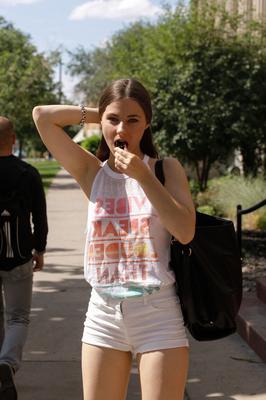 13P Brunette babe Clara Mabee shows her nice tits and shaved armpits outdoors