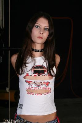 21P Slim brunette Goldie gets tied up and tortured on an abuse machine