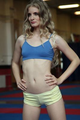 12P Slender blonde teen Cayenne Klein stretching her body in the gym