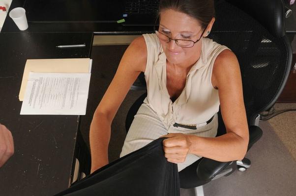 12P Sexy glasses clad MILF gives hot big cock handjob while sitting at her desk