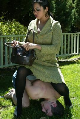 17P Dominant Asian lady gags a white man with her pantyhose on back lawn