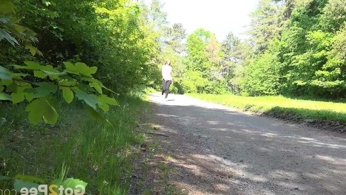 15P Euro girl Cynthia Vellons pulls down her pants to take a piss on a gravel path