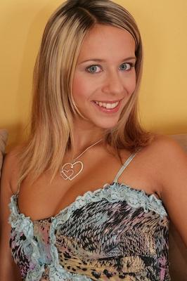 15P Horny blonde girl sheds her denim jeans and panties to get at her moist pussy