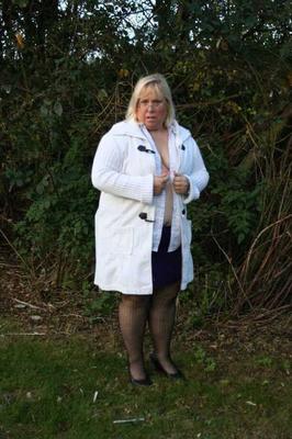 20P Obese blonde Lexie Cummings smokes while exposing herself on a path in a park