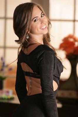 15P Clothed model Riley Reid doffs black dress to show tiny tits & hairy twat
