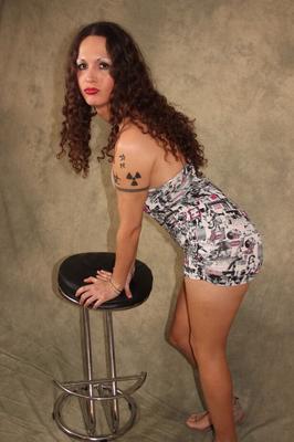 12P Alluring TS Nicole Montero posing in a sexy dress