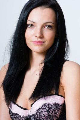 18P Dark haired girl Sapphira A shedding see thru black lingerie in nylons