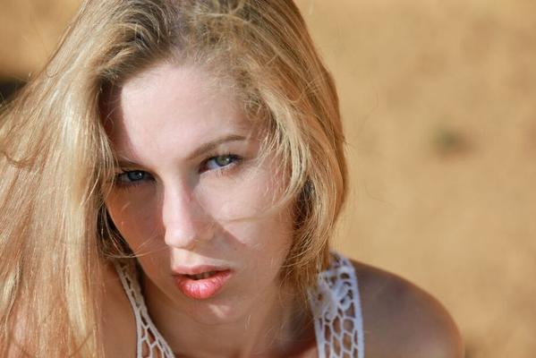 16P Alluring blonde Genevieve Gandi bares her delectable body outdoors