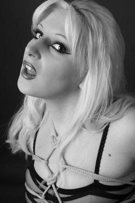 16P Blonde chick Avengelique displays her breasts while restrained with ropes