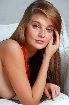 16P Blonde teen Angelina B wears only a smile and necklace while posing naked