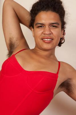 16P Black amateur Yonique shows her furry pits and bush in red fishnets