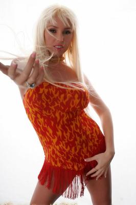 15P Hot blonde Mary Carey releases her big tits from a strapless dress